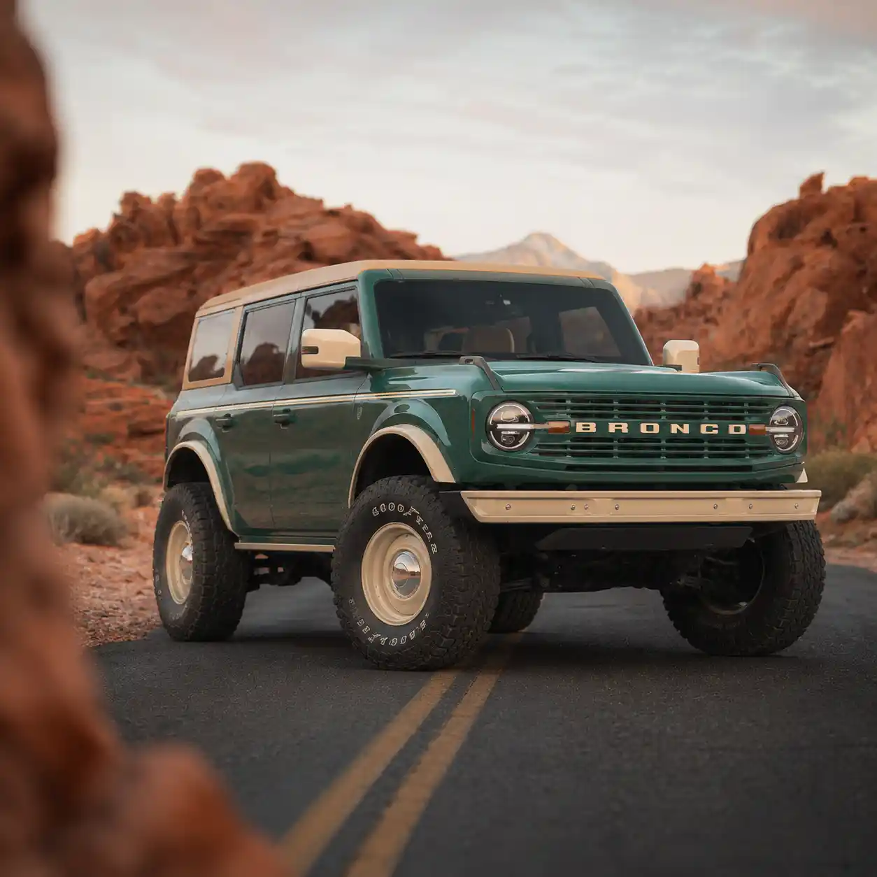 Ford Bronco in green with a customised body kit, photographed in a canyon